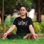 front-view-indian-woman-while-meditating-park