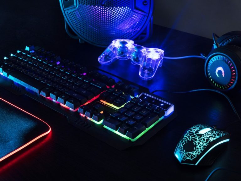 view-illuminated-neon-gaming-keyboard-setup-controller